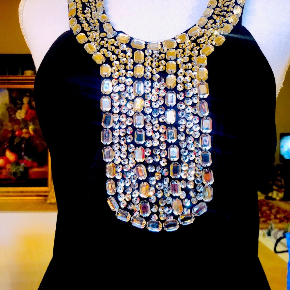 Black dress with crystal embellishments. Medium